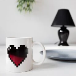KIKKERLAND Morph Coffee Mug Heart -Kikkerland CU44 Morph Coffee Mug Heart KL 2016 1303 Action 2