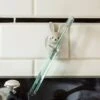 KIKKERLAND Rabbit Toothbrush Holder -Kikkerland HH55 BUNNY TOOTHBRUSH HOLD ACTION