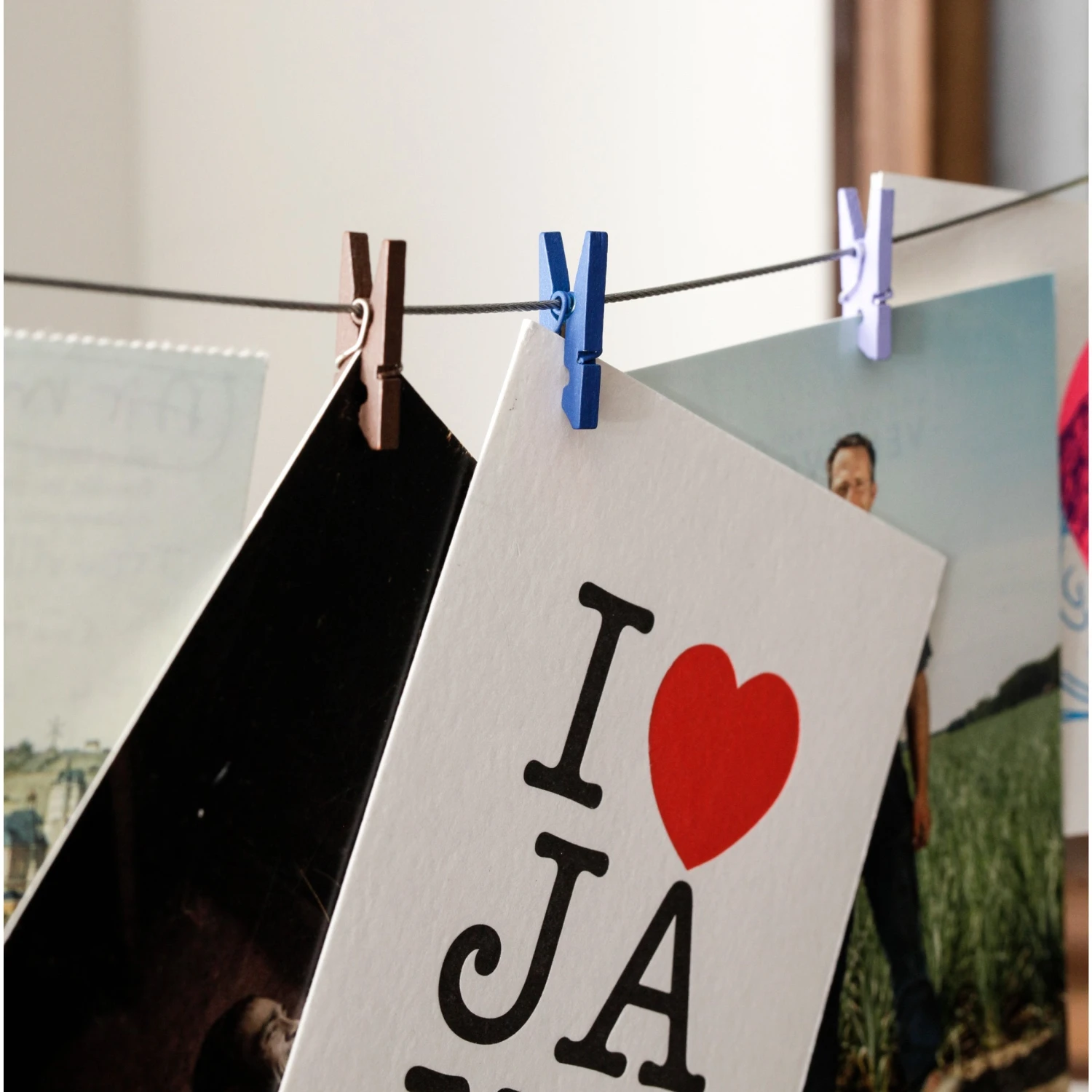 KIKKERLAND Photo Holder Wire With 10 Multicolor Mini Clothespins 5 KIKKERLAND Photo Holder Wire With 10 Multicolor Mini Clothespins - Image 3